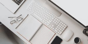 white desk with white accessories