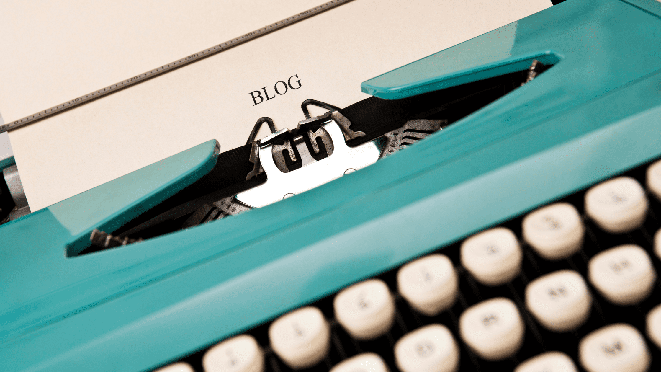 typewriter with blog written on paper
