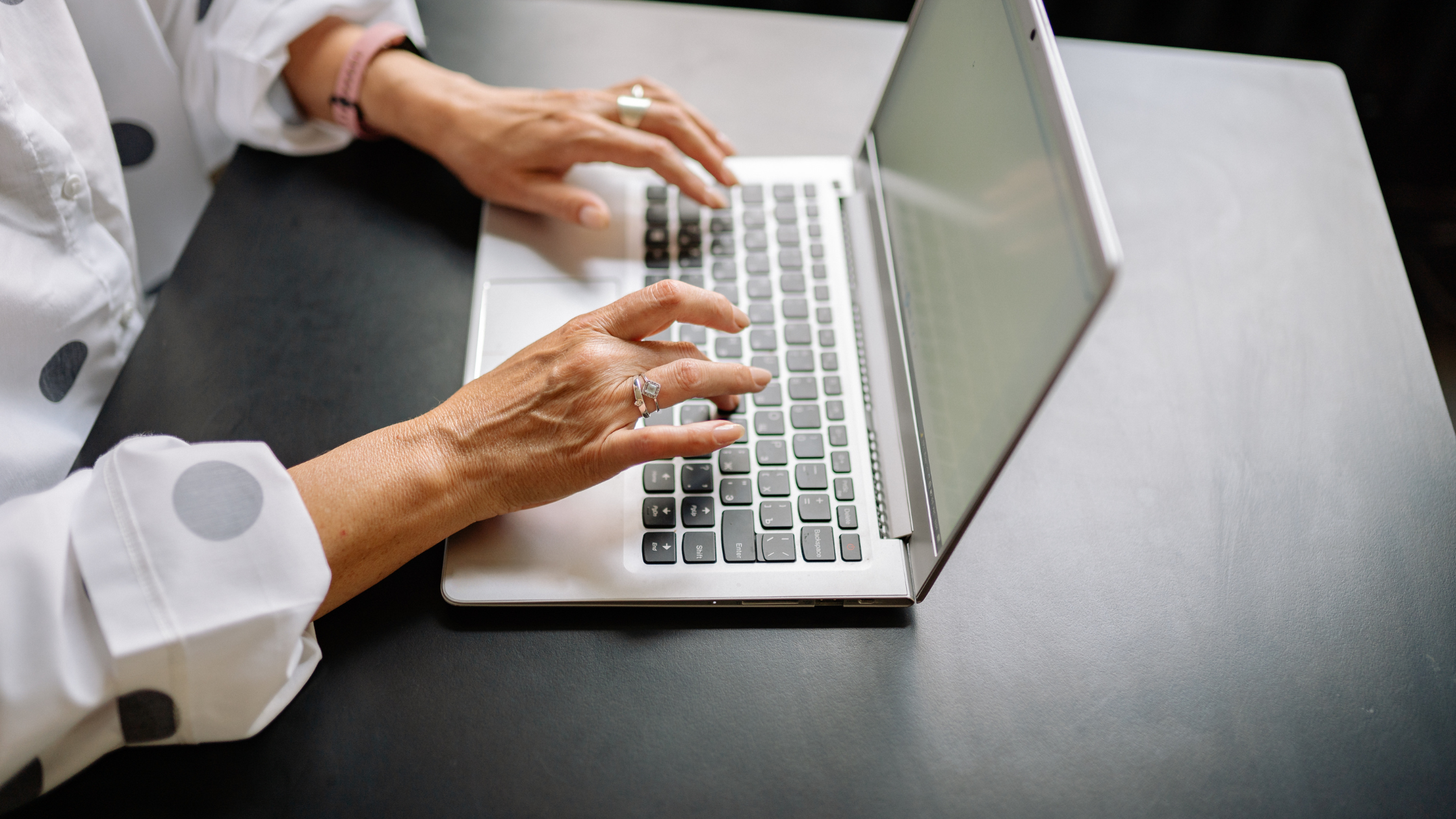 hands typing on instagram